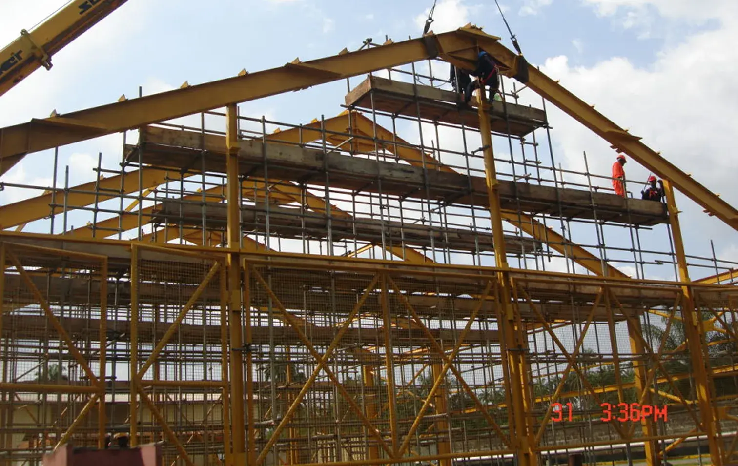Gambeta engineers erecting a steel roof frame on site